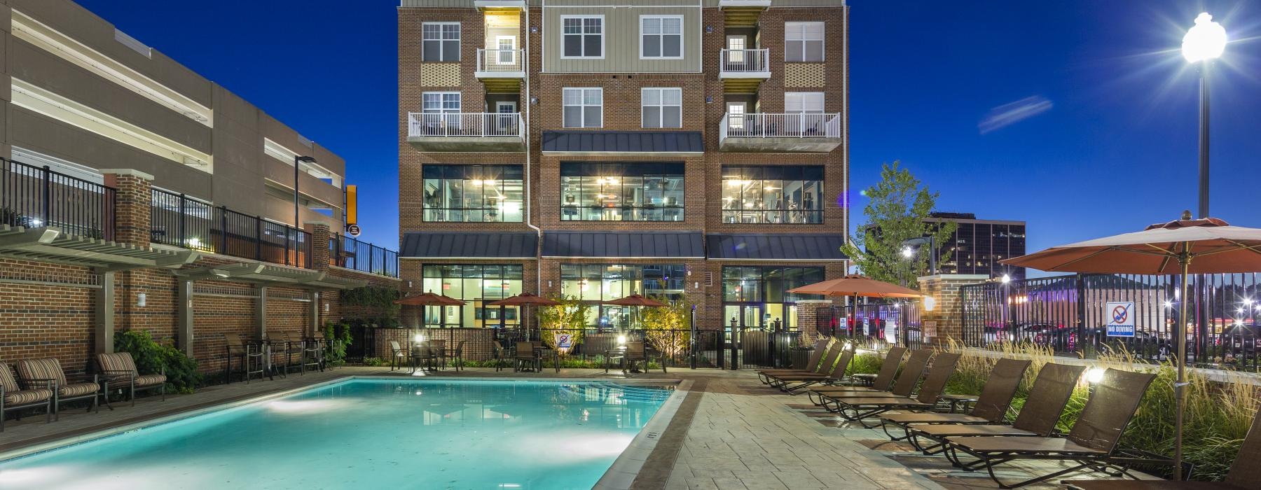 a pool in front of a building