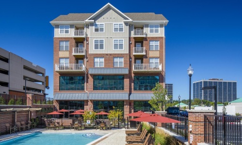 Reimagining Luxury Living | the front of a building with several windows