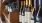 a row of wine bottles on a shelf