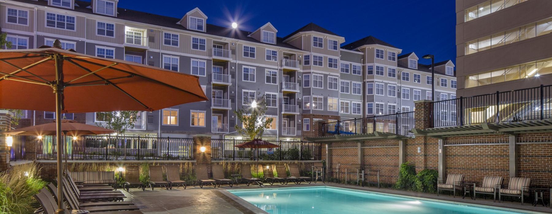 a pool in front of a building