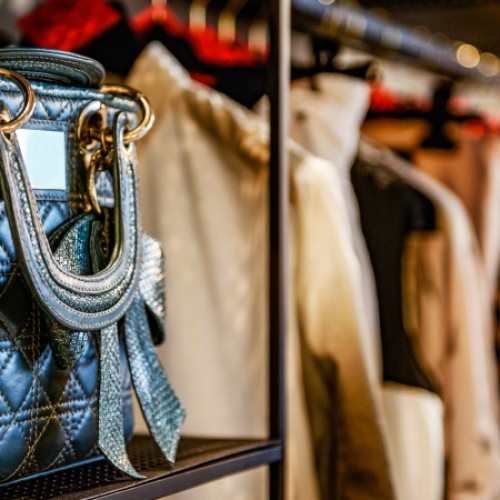 Handbags and clothes in a fashion store