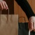 a person holding a bag