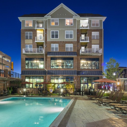 a pool in front of a building